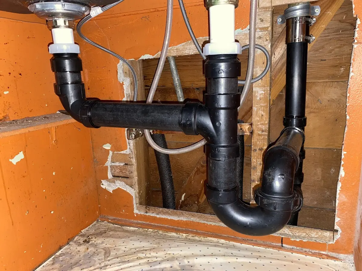Professional Garbage Disposal Repair equipment and tools on the job in Madawaska